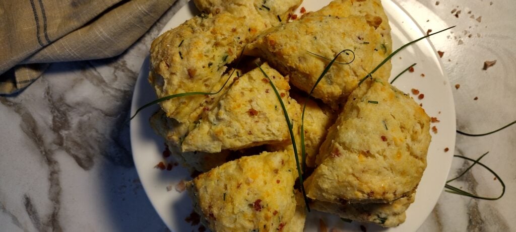 Cheese and bacon scones on a pastry stand.