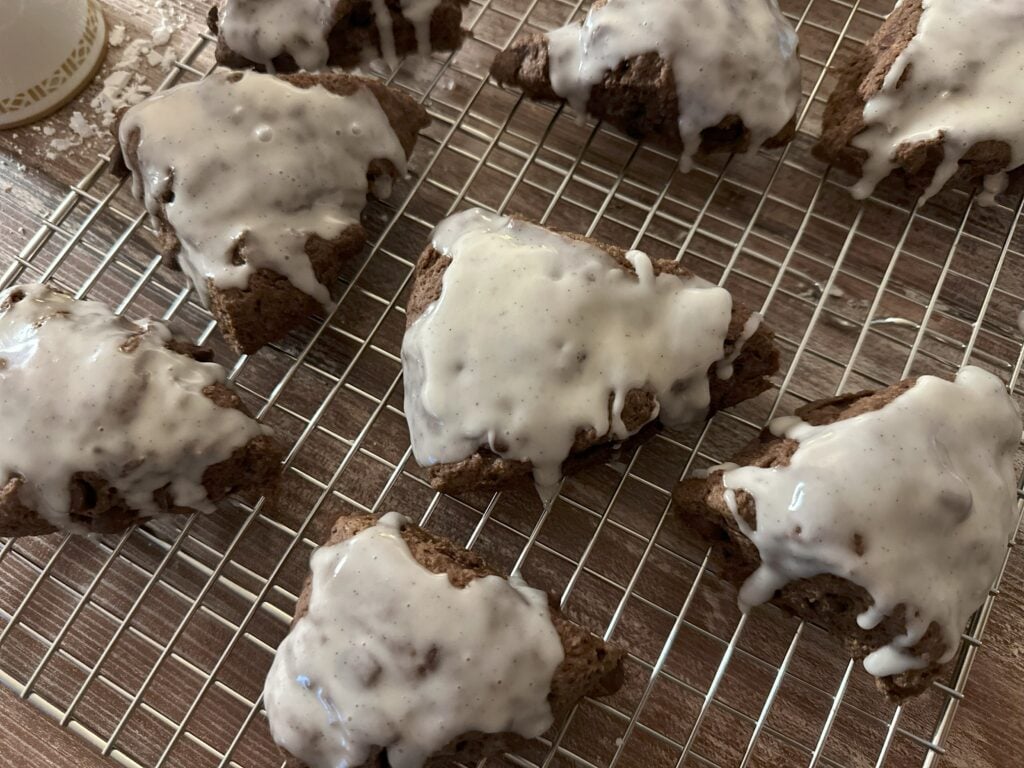 Chocolate cardamom scones with vanilla glaze.