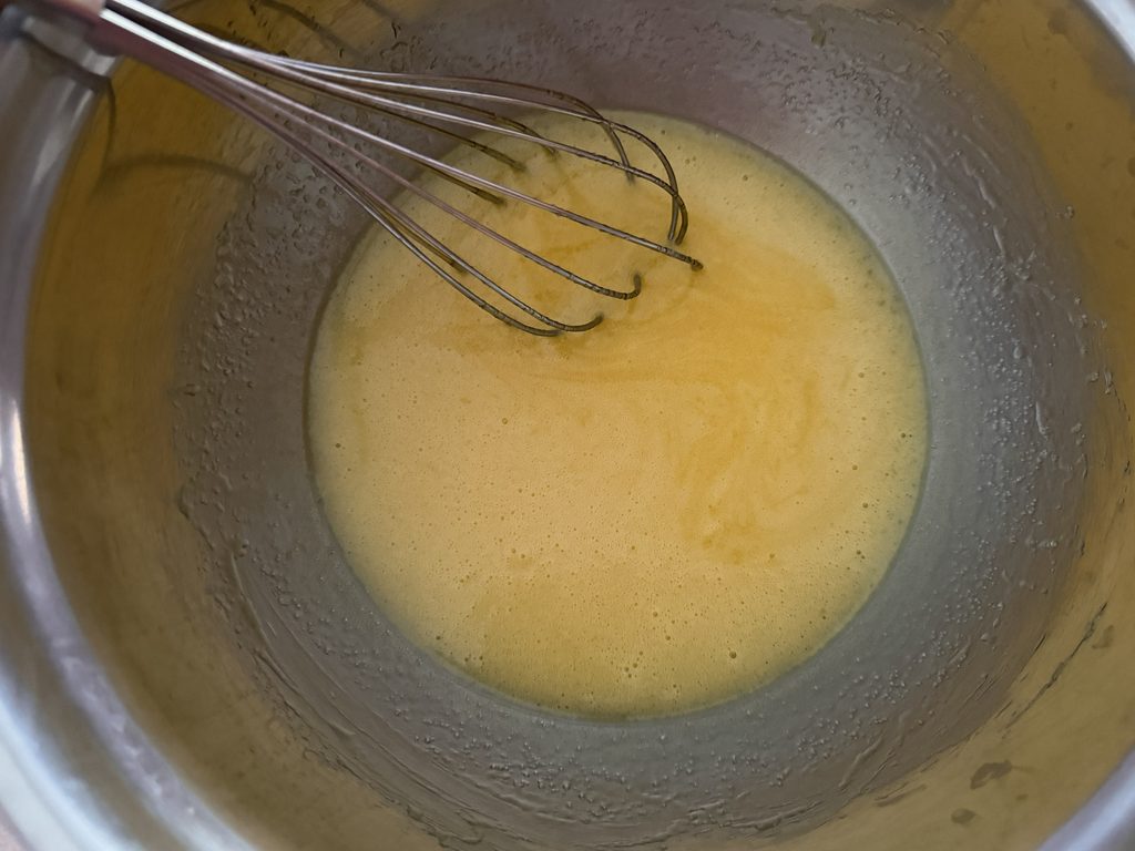 Sugar mixed into the eggs.
