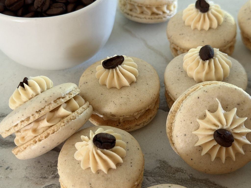 Macarons arranged on a surface.